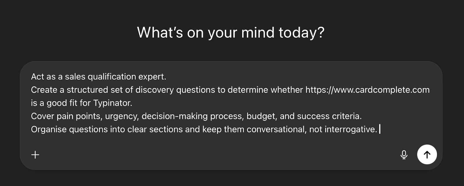 Screenshot of a chat interface with the prompt “What’s on your mind today?” displayed at the top. In the input field, a user has typed a detailed instruction asking an AI to act as a sales qualification expert and generate structured discovery questions to evaluate whether a specific website is a good fit for Typinator, covering pain points, urgency, decision-making, budget, and success criteria. The interface shows icons for adding content, voice input, and sending the message.